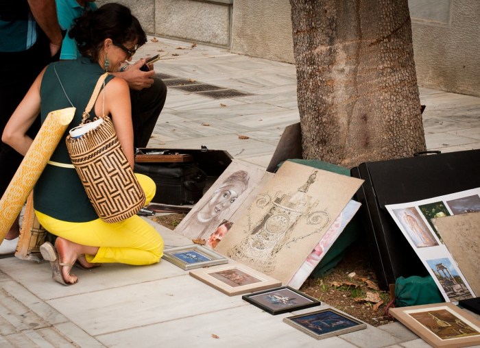 A woman looks at a drawing of the EURO Cup today in Madrid, where tonight's game against Berlin could leave one of the teams out of the playoff race.