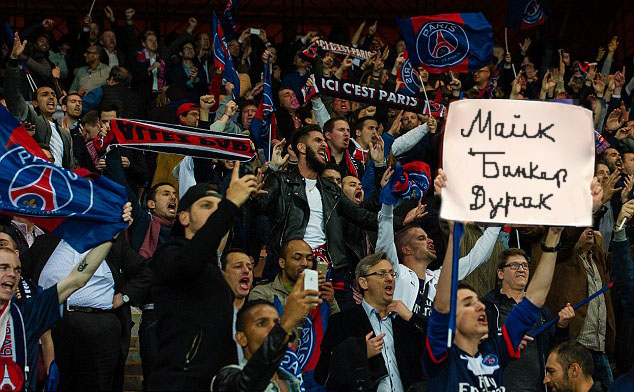 Fans in Paris cheer on the Rouges Eiffels. We'll have to ask our Minsk GM what the sign says.